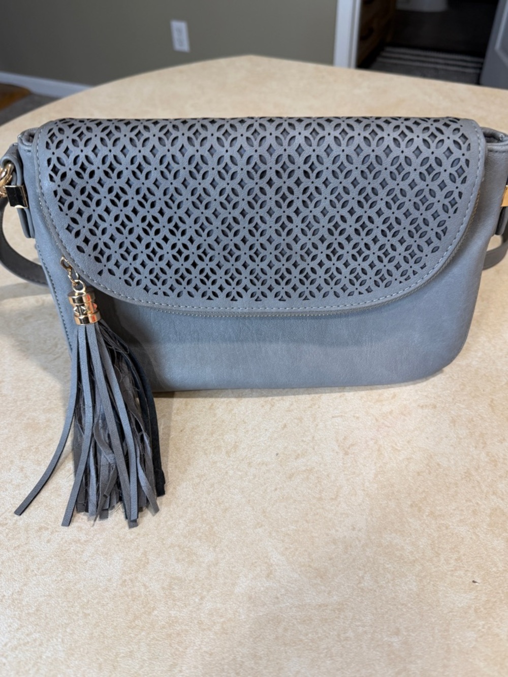 Women's Grey Laser-Cut Flap Crossbody Bag with Tassel